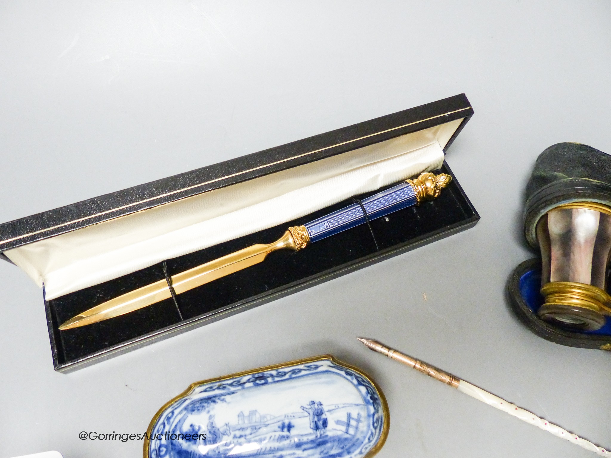 A Delft box, miniature binoculars, a mother of pearl pen and a letter opener, etc.